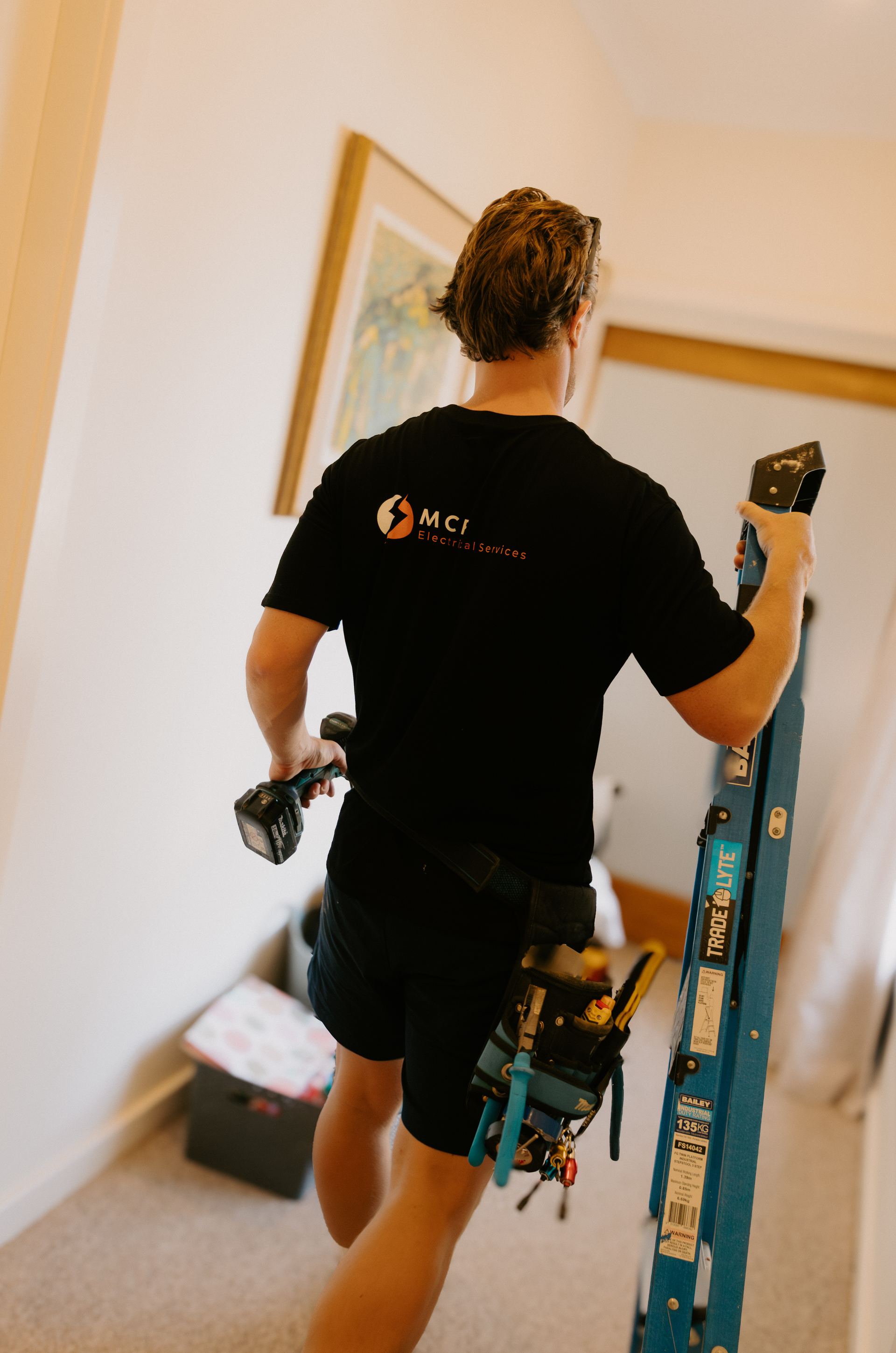 MCP Electrical Services electrician upgrading a switchboard in Minmi NSW